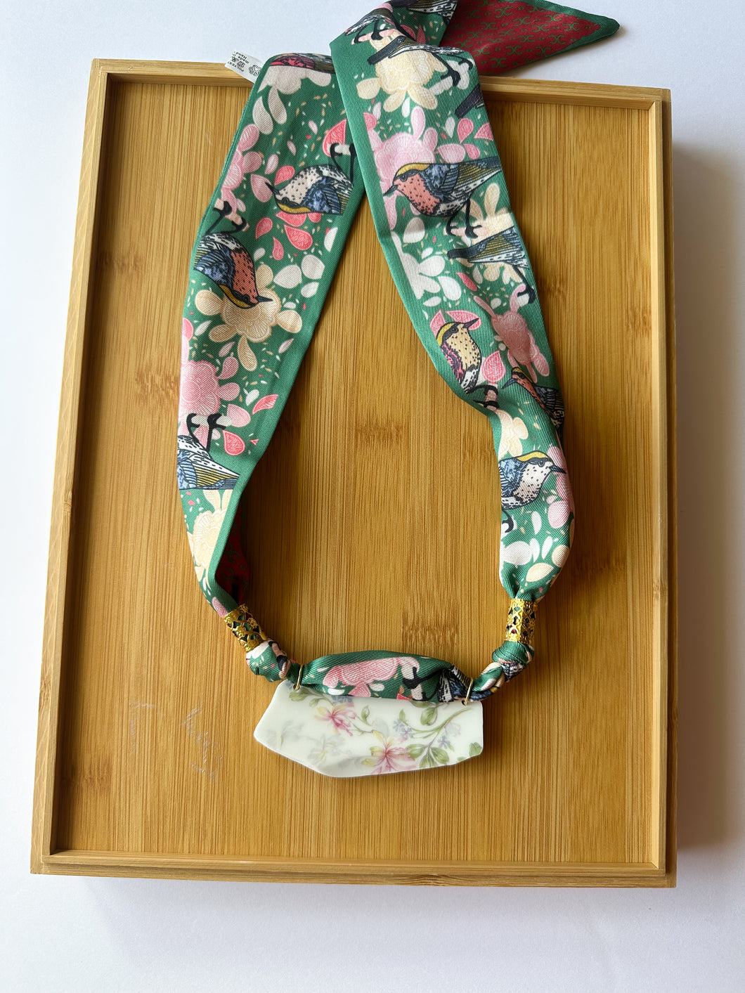 Pale Floral Piece on Green Floral Scarf Necklace