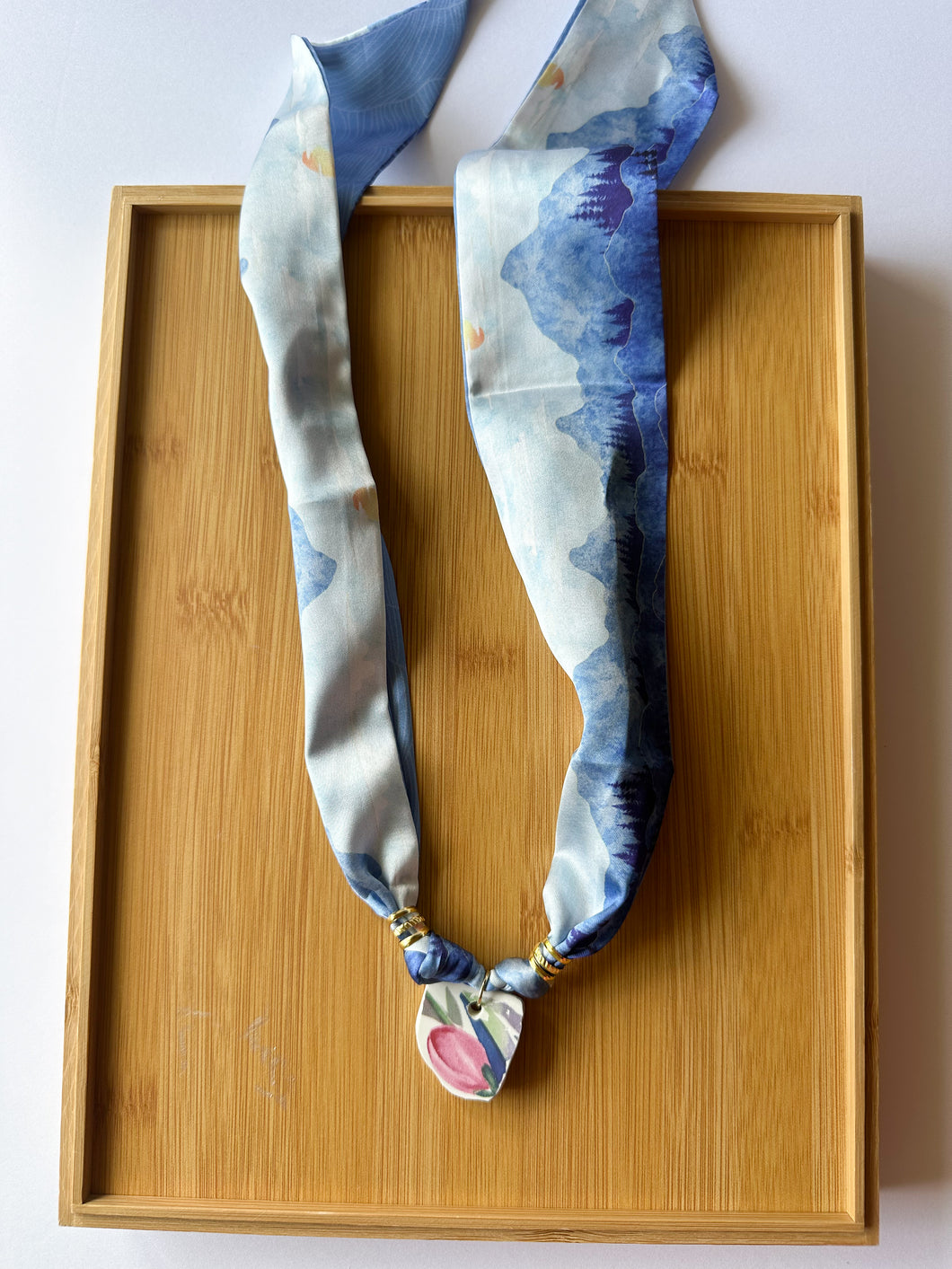 Floral Piece on Blue Mountain Scarf Necklace
