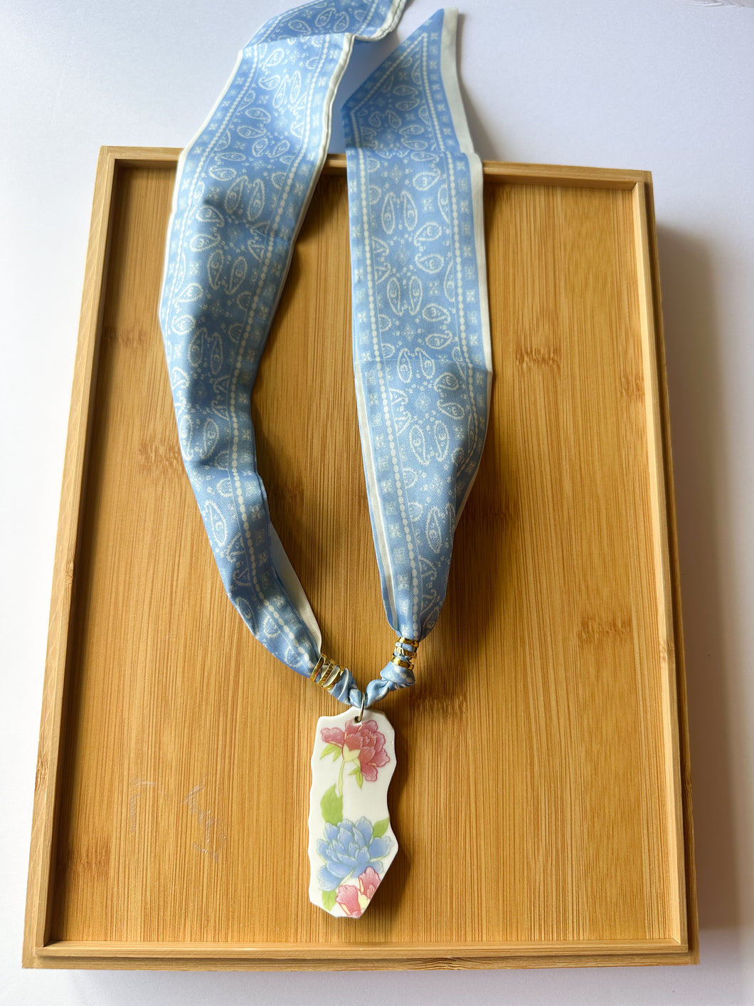Blue and Pink Floral Piece on Blue Scarf Necklace