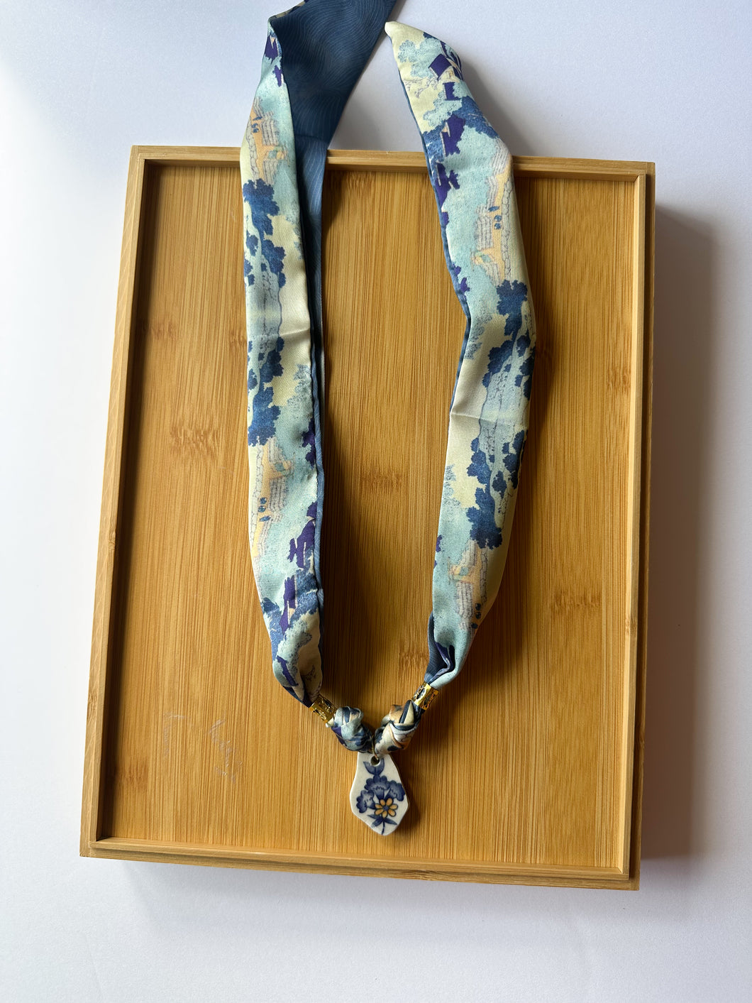 Blue and Yellow Floral Piece on Scarf Necklace
